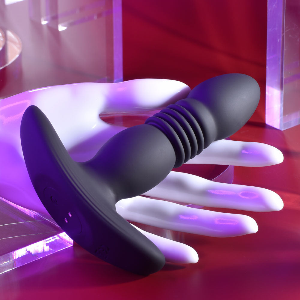 Playboy Pleasure TRUST THE THRUST -  13.7 cm USB Rechargeable Thrusting Butt Plug with Wireless Remote